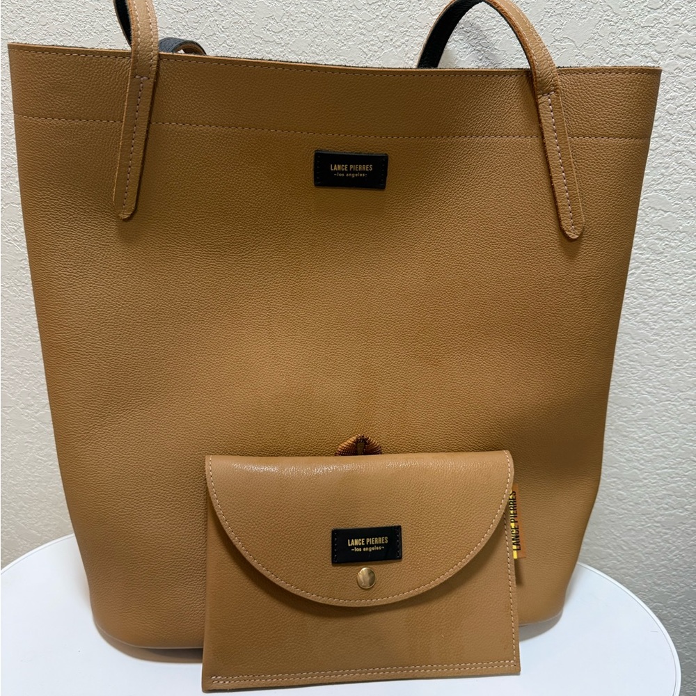Reversible tan/black tote with wallet